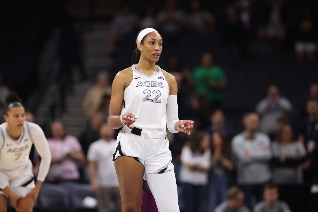 A'ja Wilson in a white Aces number 22 jersey on court