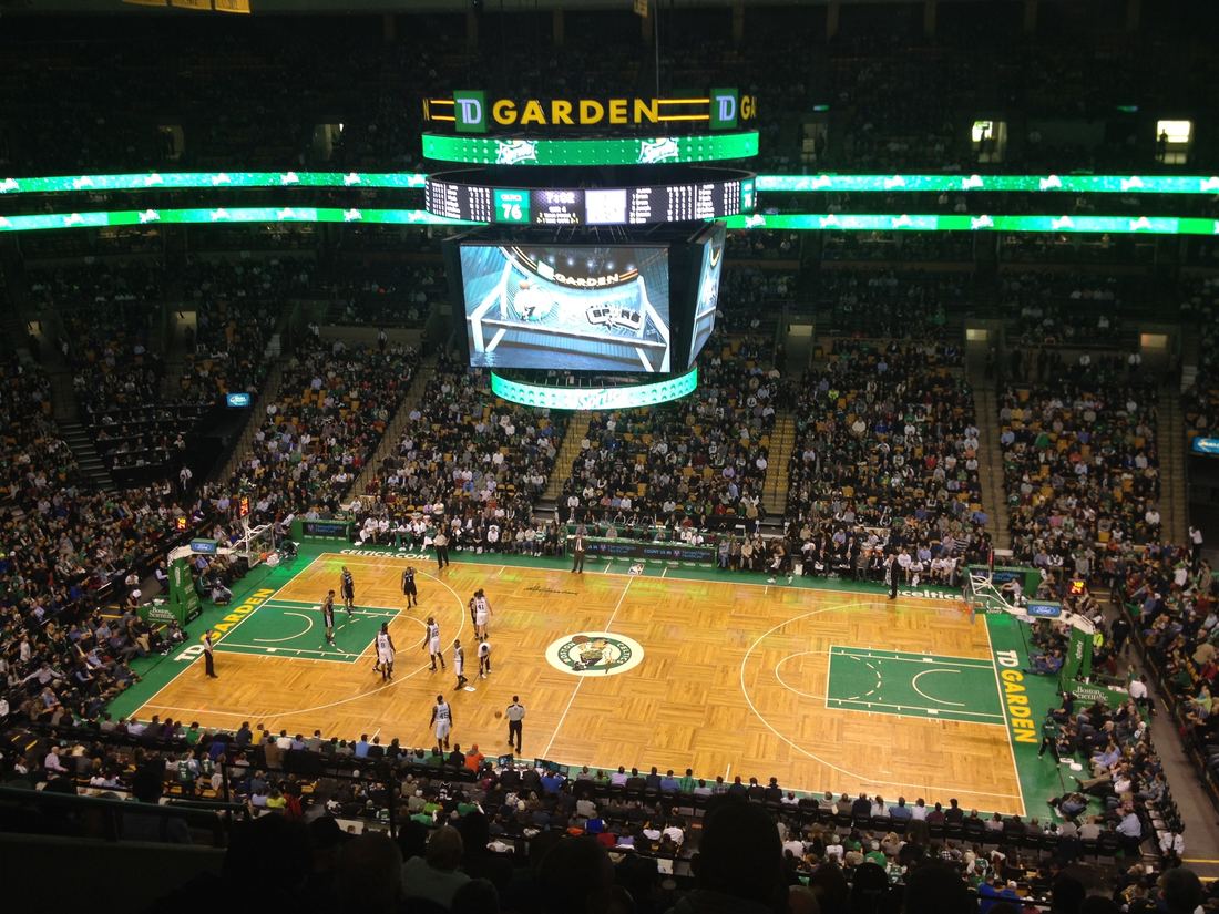 The parquet court at TD Garden during a Celtics game, seen from the upper deck