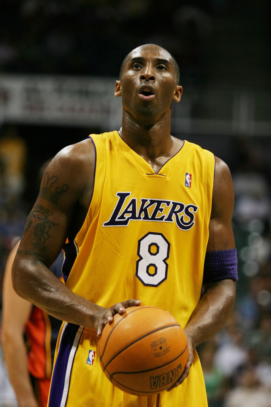 Kobe Bryant at the free throw line wearing number 8 for the Lakers