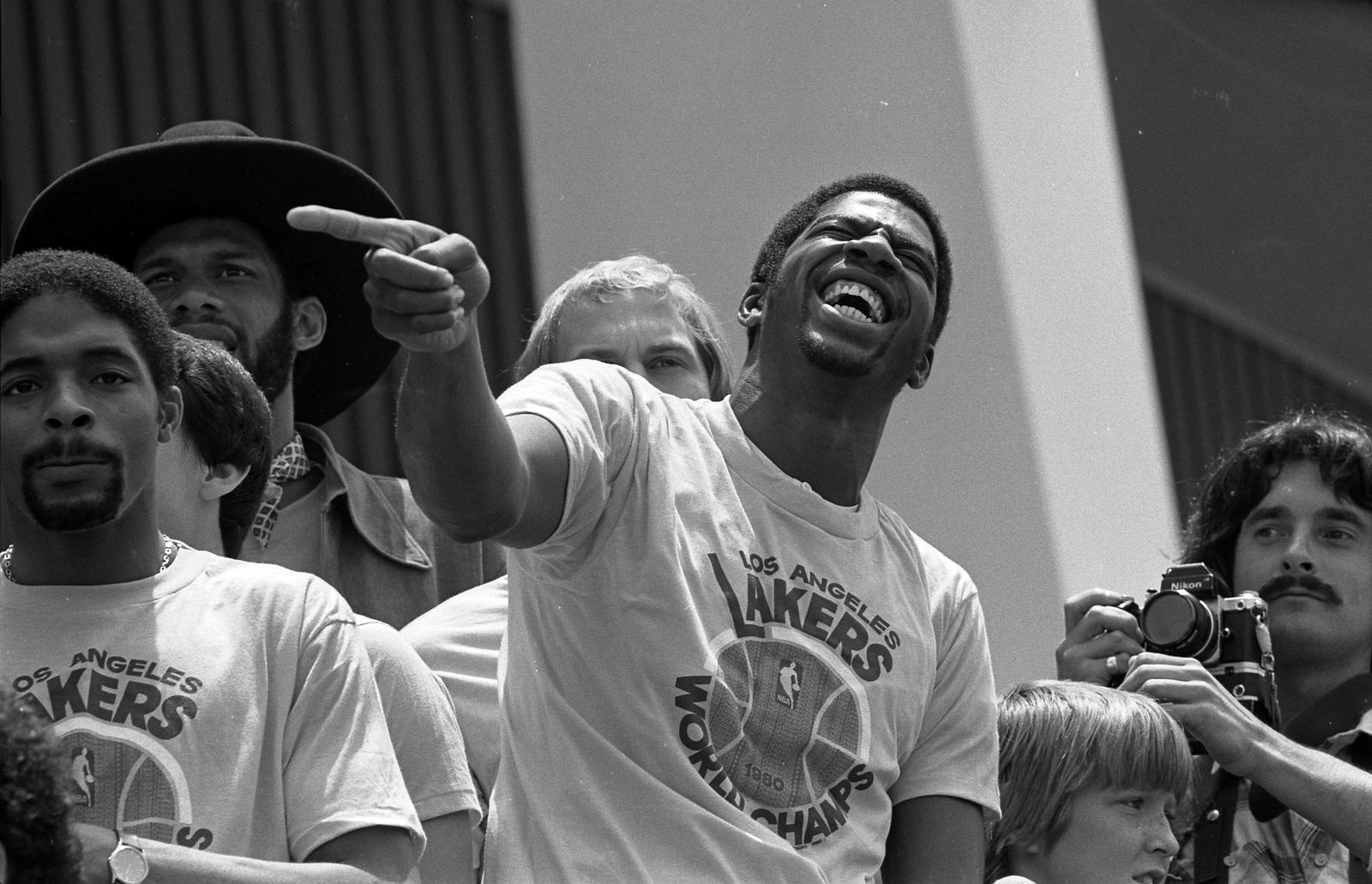 Magic Johnson celebrating at the Lakers 1980 championship rally