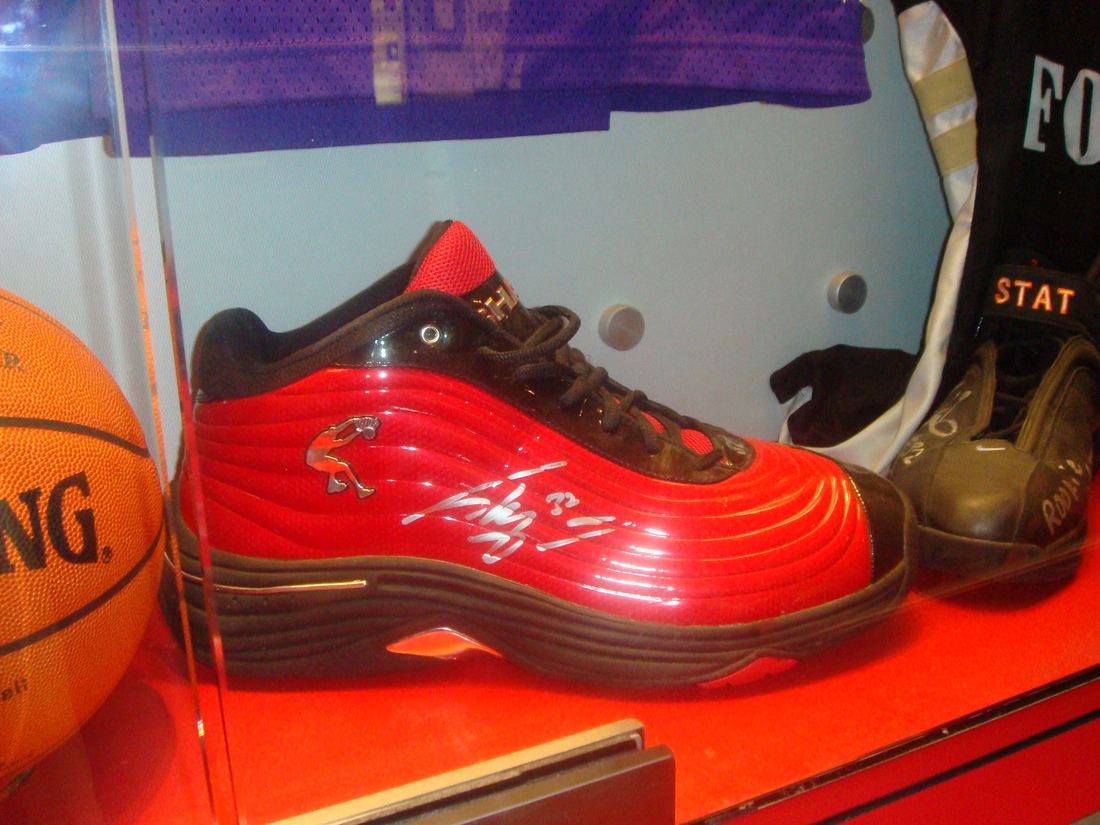 A huge red signed basketball shoe worn by Shaquille O'Neal on display at the Hall of Fame